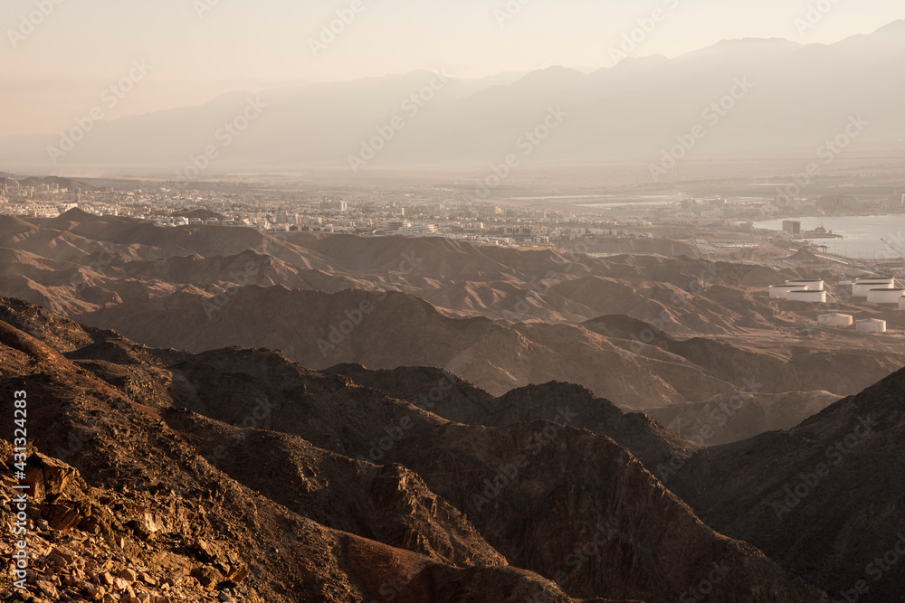 Arid desert mountains against the backdrop of the Red Sea. Shlomo mountain, Eilat Israel. Morning Daylight . High quality photo