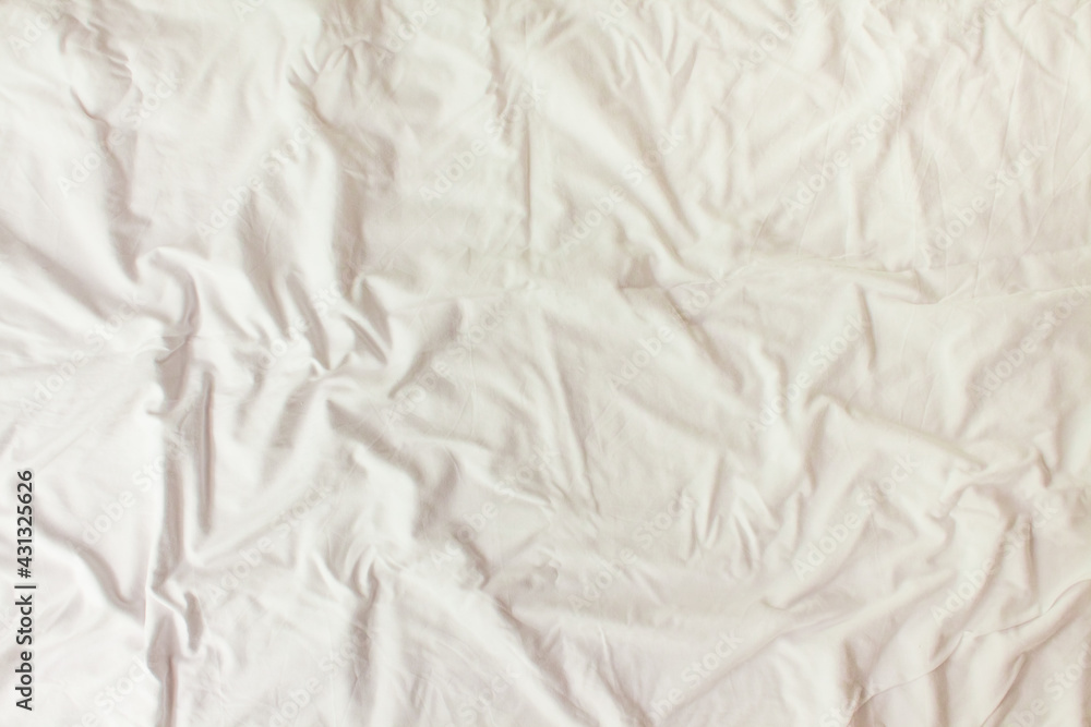 Obraz premium Flat layout white background. Modern minimal background with fabric texture and folds of cotton fabric. Top view