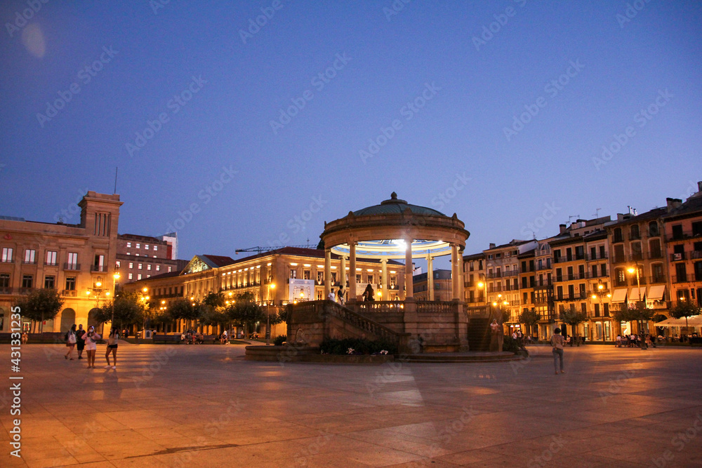 Pamplona Castle Square at night with the famous roundabout in the middle Pamplona Castle Square at night with the famous roundabout in the middle