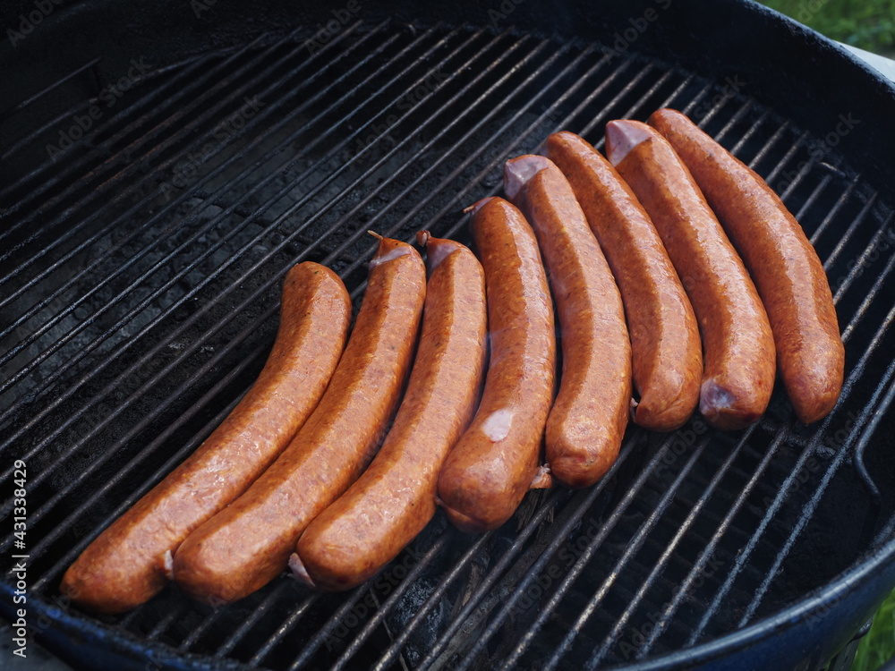 Farmer sausages smoked and grilled on the charcoal grill Farmer sausages smoked and grilled on the charcoal grill