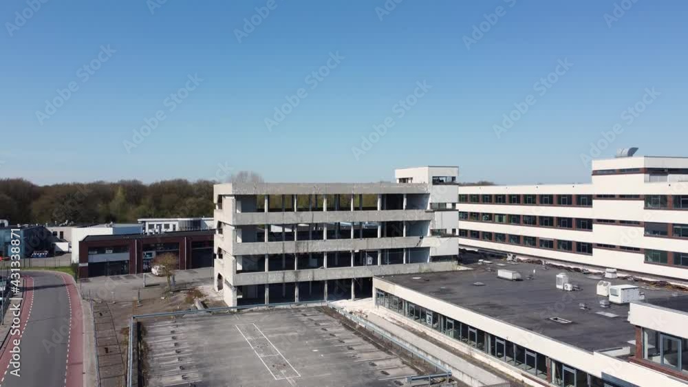 Half demolished building open constuction, upwards aerial