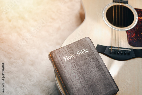 Принти на полотні Christians worship God with a guitar with the Holy Bible
