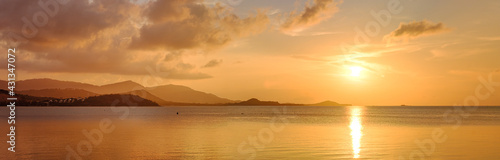 Bangrak beach ,Koh samui ,Suratthani, thailand, panorama landscape suset cloudy sky at sunset ,mountain background.