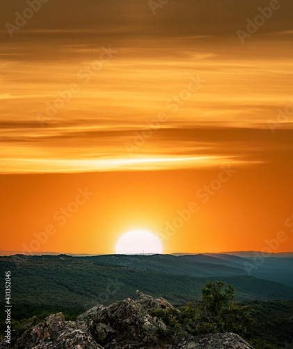 Orange sunset with text space over the mountain range