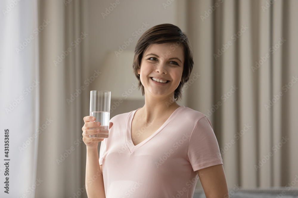 Smiling Caucasian pregnant woman enjoy clean pure still mineral water, feel dehydrated thirsty at home. Happy millennial female follow healthy lifestyle during pregnancy. Diet, hydration concept. Smiling Caucasian pregnant woman enjoy clean pure still mineral water, feel dehydrated thirsty at home. Happy millennial female follow healthy lifestyle during pregnancy. Diet, hydration concept.