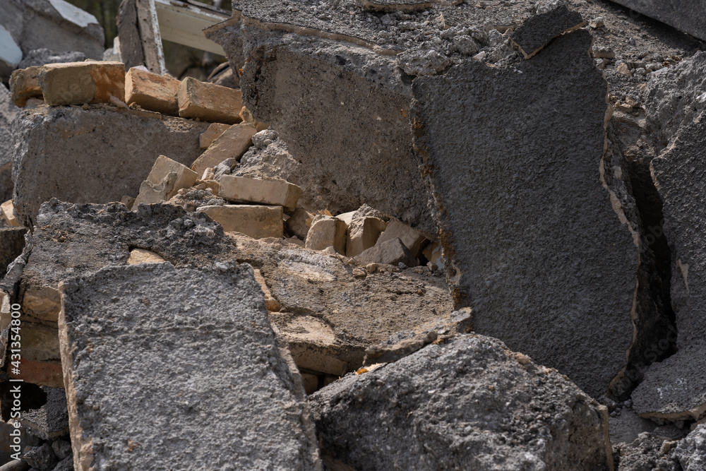 a lot of broken concrete blocks due to the demolition of the house