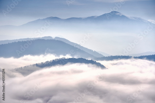 mountains in fog and clouds