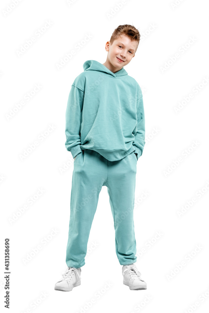 Handsome boy in blue suit isolated on white background. Studio portrait of a child. Handsome boy in blue suit isolated on white background. Studio portrait of a child.