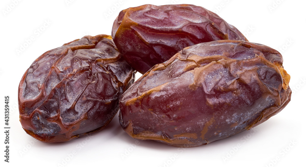Dried dates Medjool, close-up isolated on white background Dried dates Medjool, close-up isolated on white background