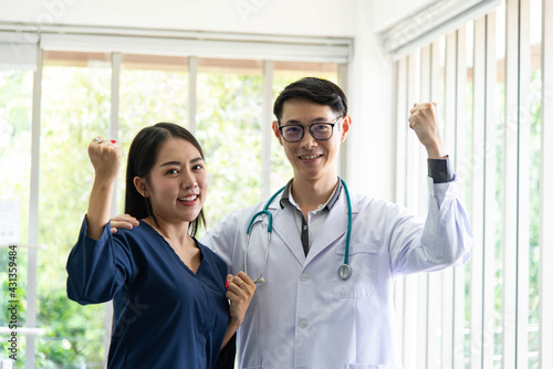 Mental health concept. Asian doctor encouraged young  beautiful patient. Patient feeling happy after get advice from phychologist. photo