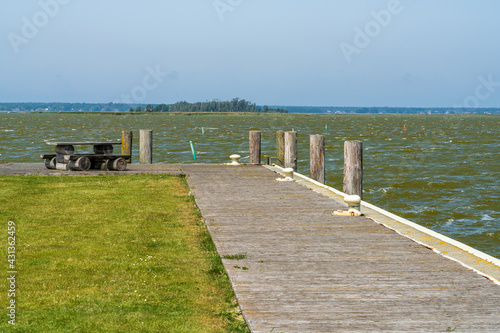 A picnic bench with seaview in the harbour of Neuendorf, Mecklenburg-Western Pomerania, Germany © Bernd Brueggemann