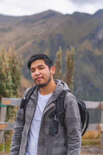 Young man enjoying the outdoors in the mountains.