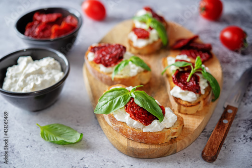 Ricotta dried tomato Basil bruschetta