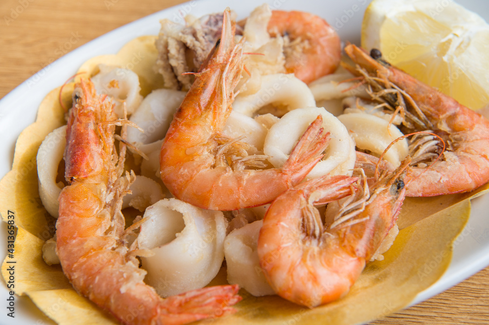fried squid and shrimp fish from the mediterranean sea in Italy fried squid and shrimp fish from the mediterranean sea in Italy