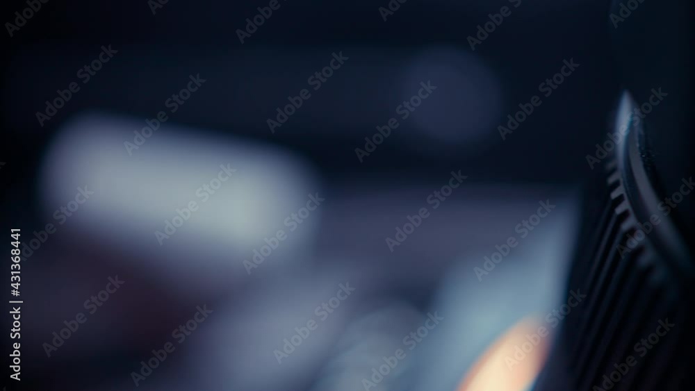 the lens of a movie camera or photo camera is shot in close-up the lens of a movie camera or photo camera is shot in close-up