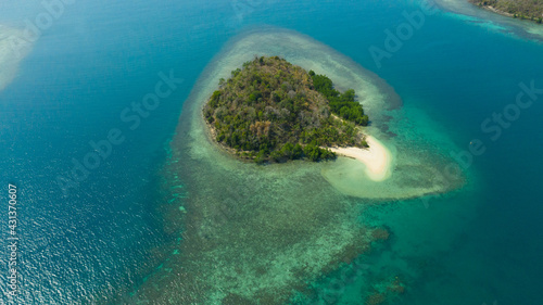 Tropical island with sandy beach on the Zamboanga Peninsula. Sallangan Island. Mindanao, Philippines. © Alex Traveler