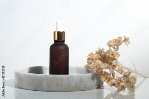 mockup of beauty fashion cosmetic makeup bottle lotion serum dropper product with skincare healthcare concept on background