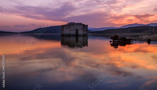 The submerged church of Zhrebchevo dam, Bulgaria photo
