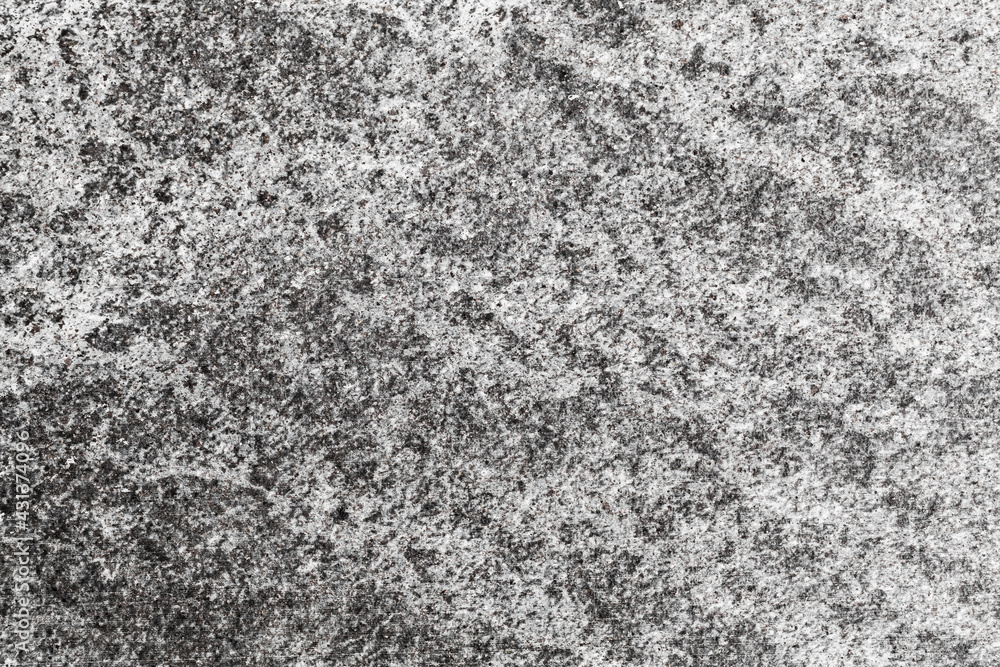 Natural dark gray granite stone pattern, close up background