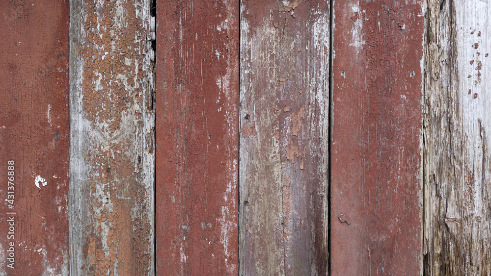 Background of old red boards with peeling paint Background of old red boards with peeling paint