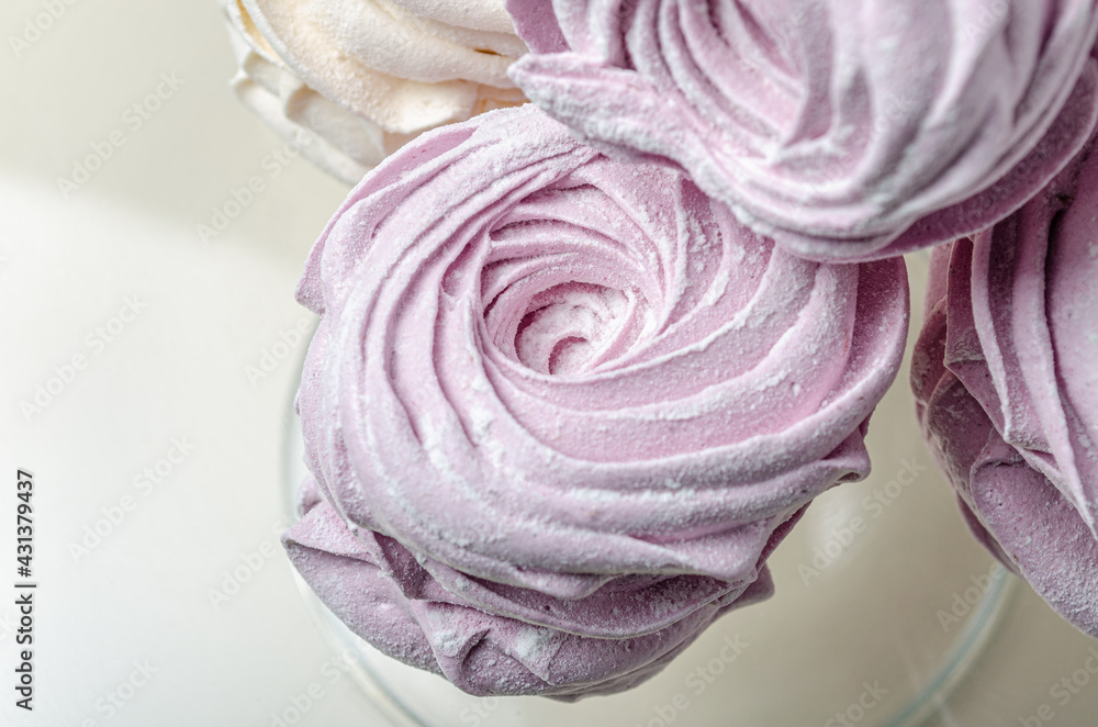 The marshmallow is curly in a glass vase. High quality photo The marshmallow is curly in a glass vase. High quality photo