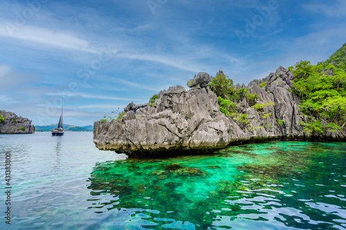 Twin Lagoon on paradise island with sharp limestone rocks  tropical travel destination - Coron  Palawan  Philippines.