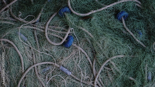 фотографія fishing net with buoys and leads