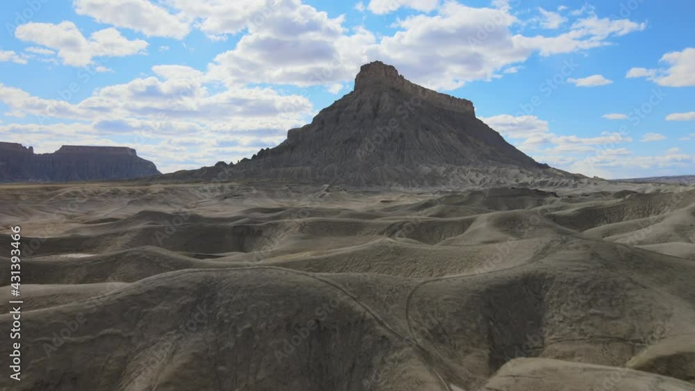Incredible desert landscape slowly coming into view as drone rises into the air in Caineville Utah Incredible desert landscape slowly coming into view as drone rises into the air in Caineville Utah