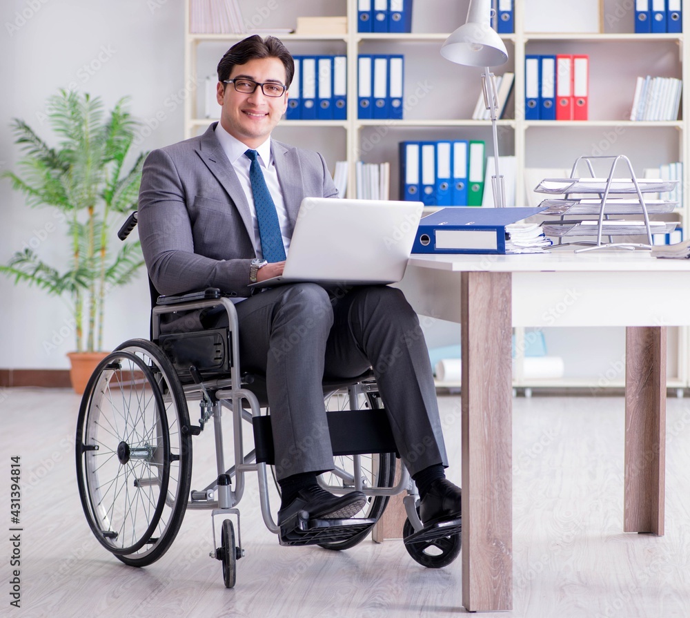 Disabled businessman working in the office Disabled businessman working in the office