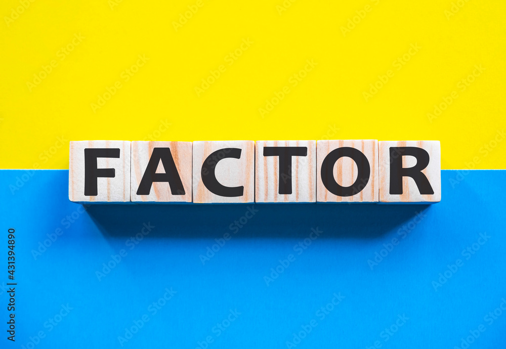 Word FACTOR on wooden cubes with word on beautiful yellow and blue background. Business, media marketing concept. list of items to be discussed at formal meeting Word FACTOR on wooden cubes with word on beautiful yellow and blue background. Business, media marketing concept. list of items to be discussed at formal meeting