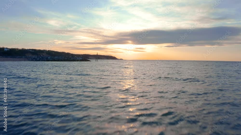 Beach sunset ocean water with land bed Beach sunset ocean water with land bed