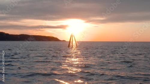 looking into the sun in the ocean water