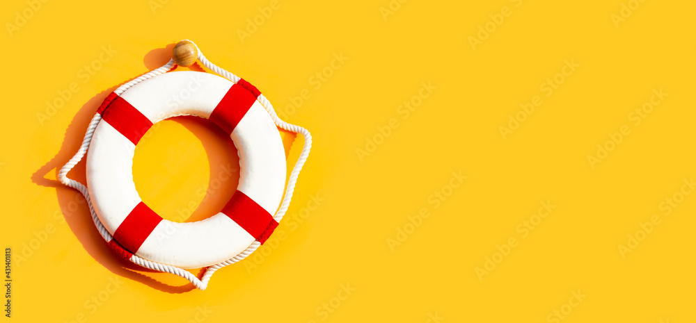 Lifebuoy on yellow background. - obrazy, fototapety, plakaty 