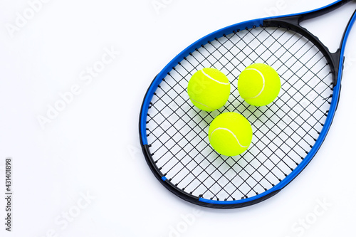 Tennis racket with balls on white. © Bowonpat