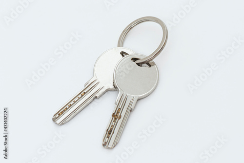 Close up of keys on white background. © dnd_project