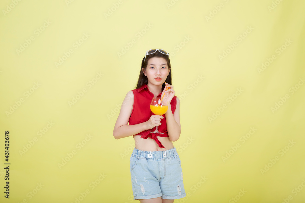 Woman holding a glass of juice Woman holding a glass of juice
