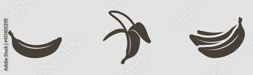 Vector graphic one-color black ripe bananas set on a gray background.
