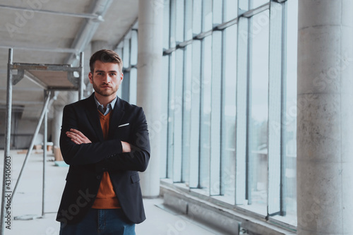 Wallpaper Mural a successful entrepreneur oversees the construction site of startup office Torontodigital.ca