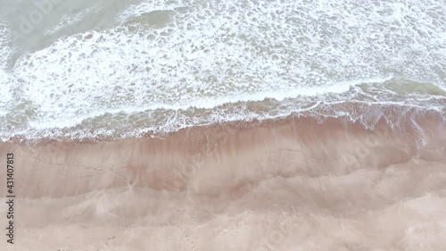water flowing into the water. beach. argentina. 