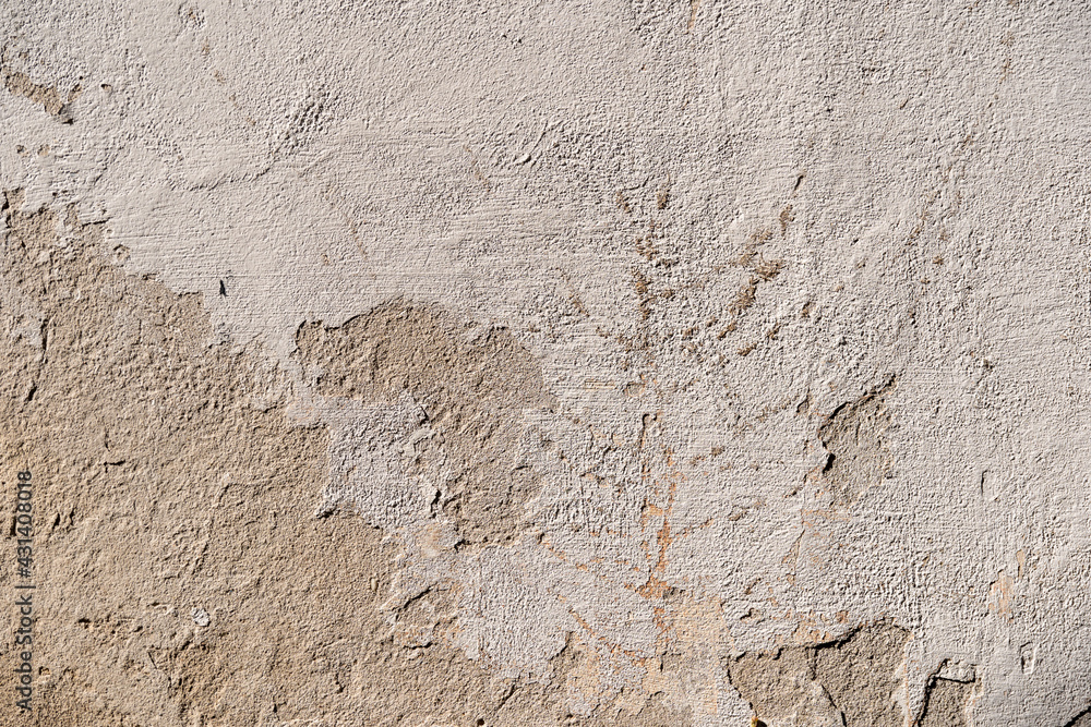Weathered wall plaster with cracks and imperfections background. Full frame texture of white render. Material surface pattern with dirty and damage on a house. Weathered wall plaster with cracks and imperfections background. Full frame texture of white render. Material surface pattern with dirty and damage on a house.