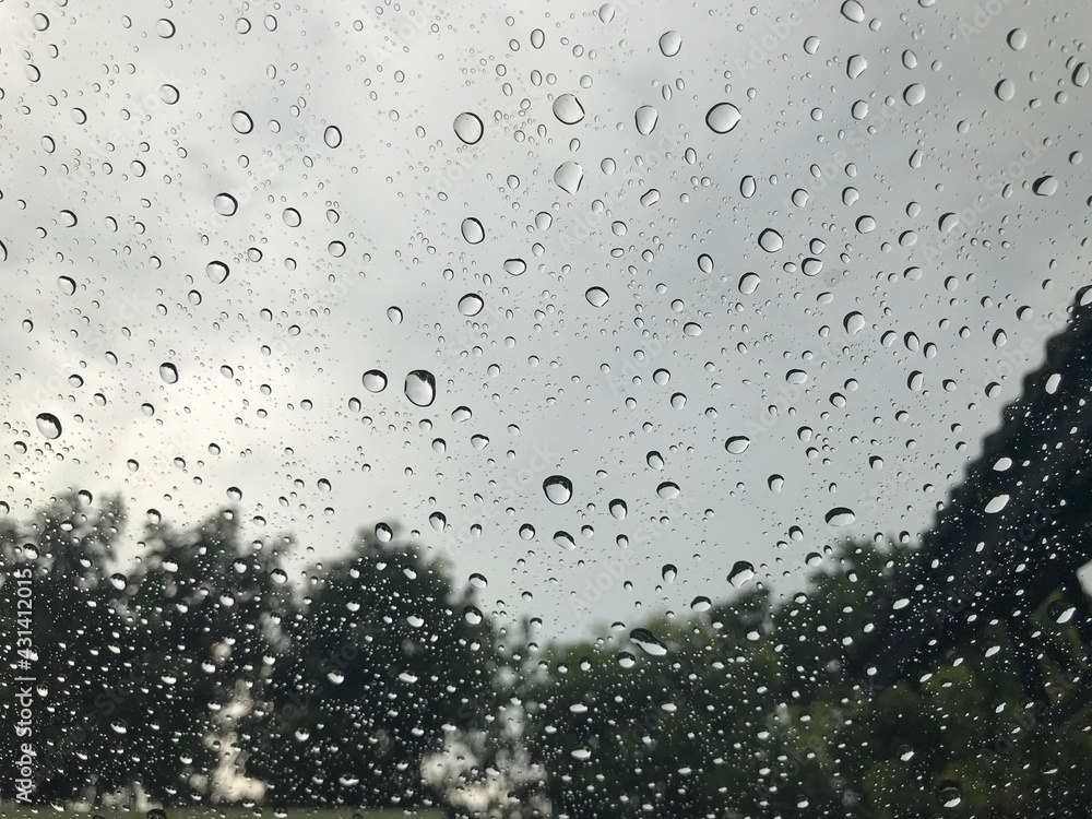 rain water drops on the window glass texture.
