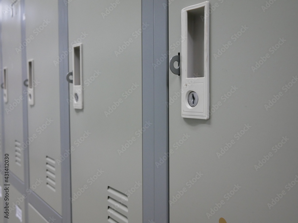 closeup of locker cabinets in a locker room.
closeup of locker cabinets in a locker room.