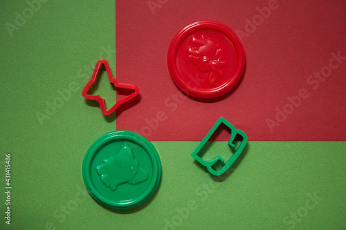 red and green buttons with play toys