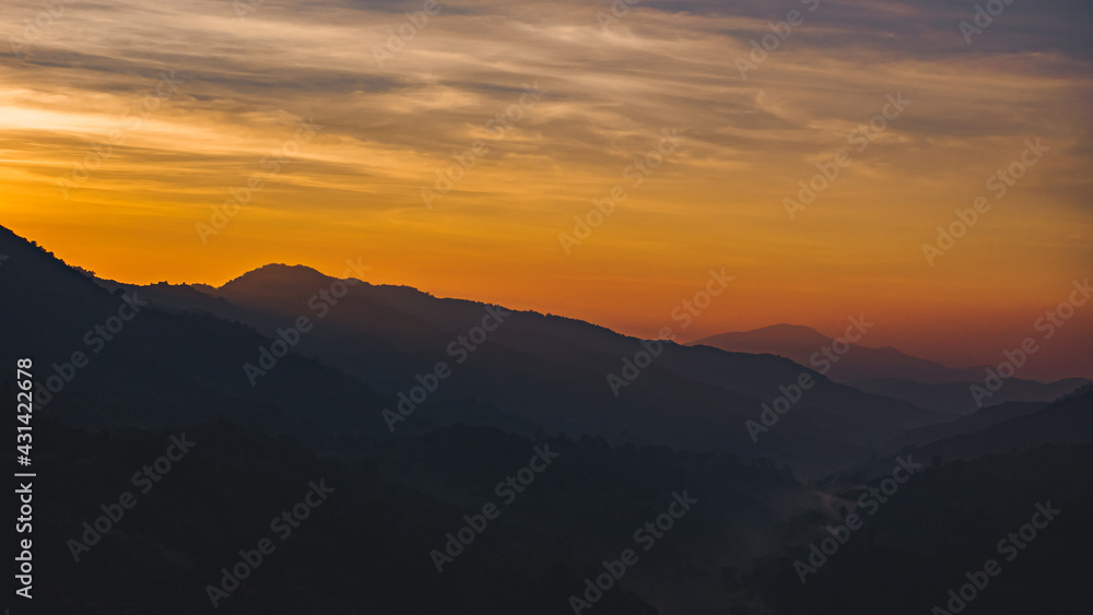 Sun sunrise bright sunlight over mountain.
