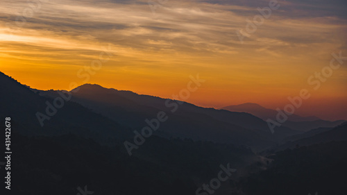 Sun sunrise bright sunlight over mountain.