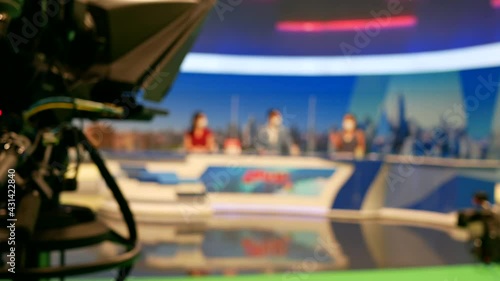 abstract blurred of broadcast camera in studio at TV station.