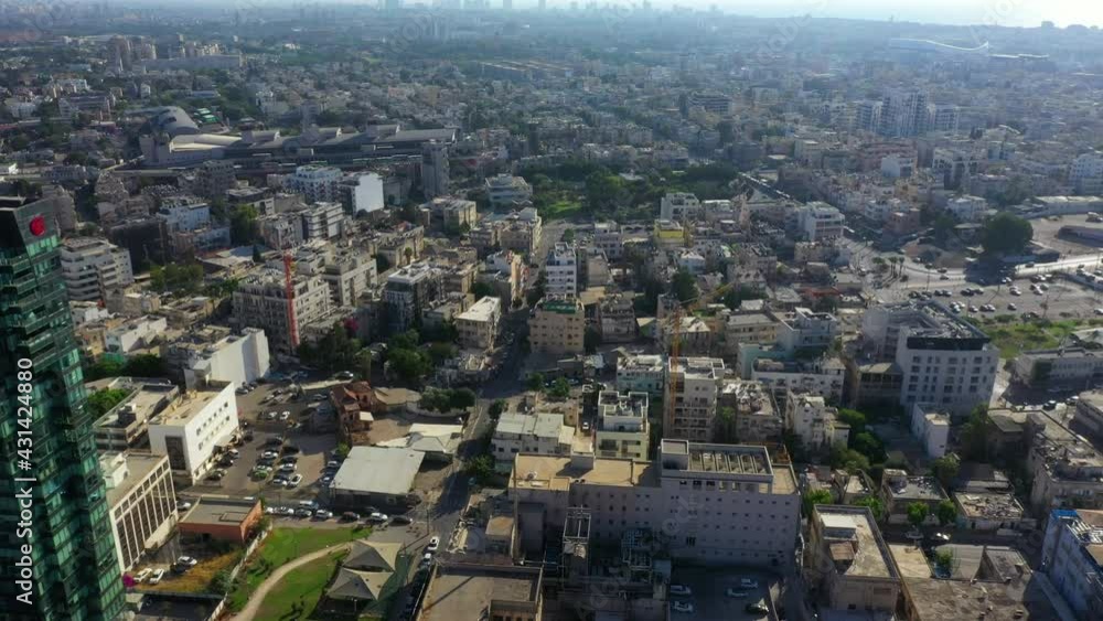 Aerial Panning Shot Of City With Modern Skyscrapers On Sunny Day, Drone Flying Forward Over Cityscape - Tel Aviv, Israel Aerial Panning Shot Of City With Modern Skyscrapers On Sunny Day, Drone Flying Forward Over Cityscape - Tel Aviv, Israel