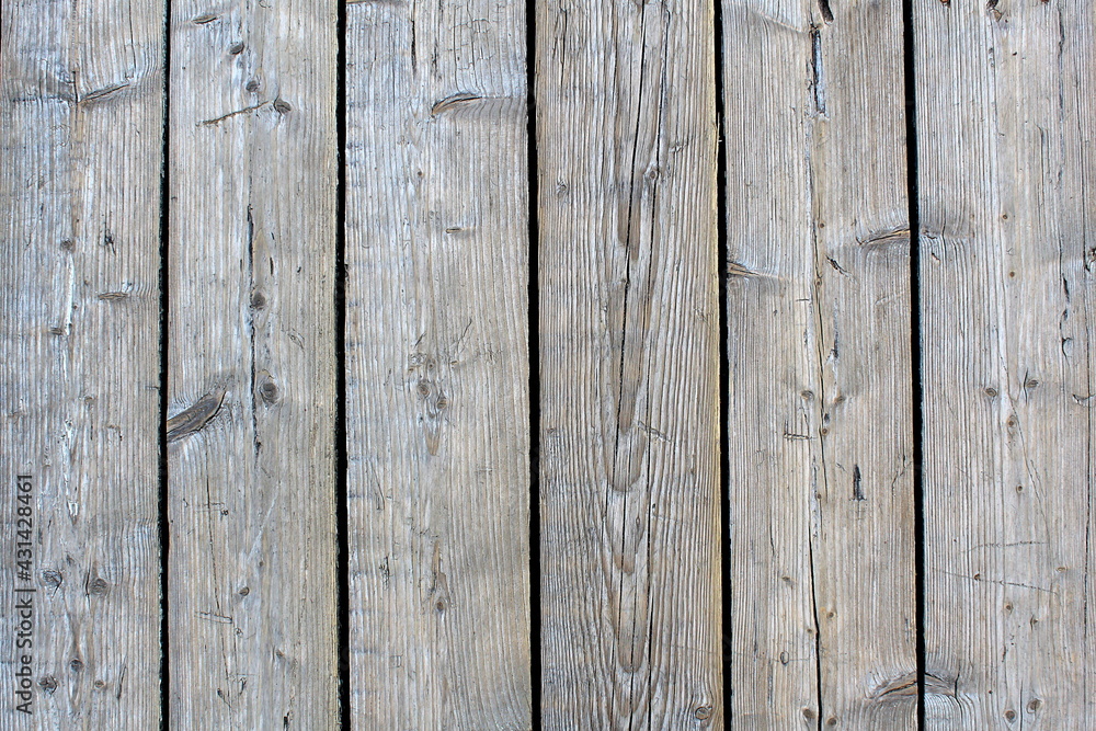 The texture of the wooden planks are horizontal The texture of the wooden planks are horizontal