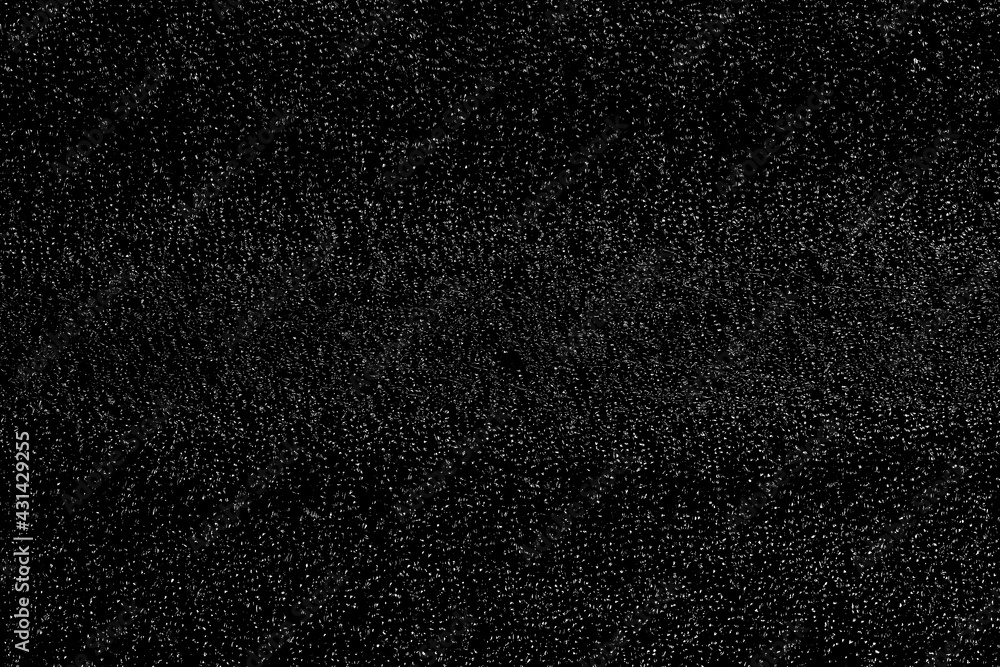 Fototapeta premium Chaotic white bokeh on a black background. light spots texture. abstraction. falling snow. starry sky. bright glare of light texture