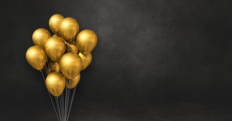 Gold balloons bunch on a black wall background. Horizontal banner.